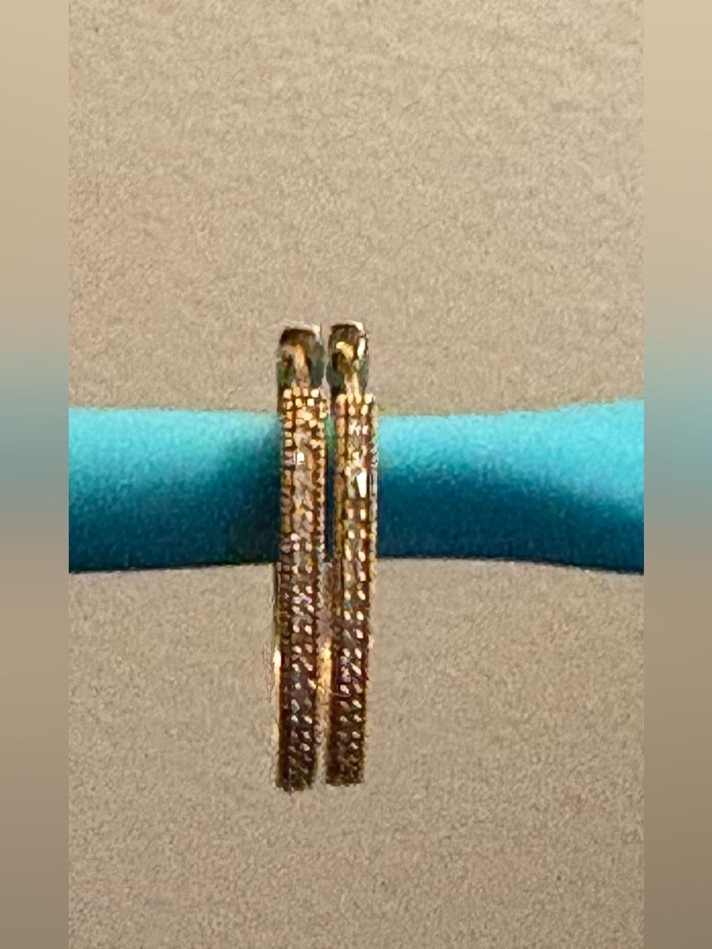 10k yellow gold with white diamonds oval hoop earrings